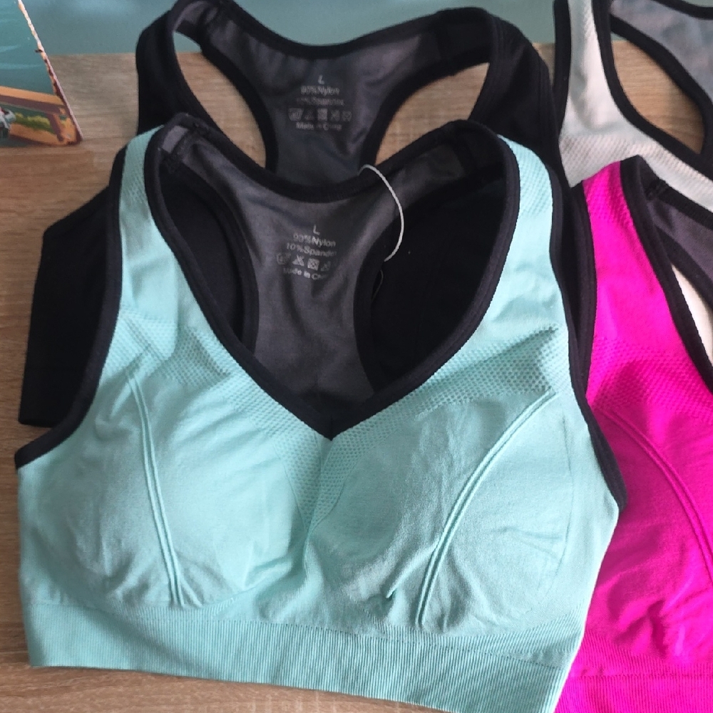 Seamless 4 Sports Bra with Black Trim. Green, Pink, White and Black